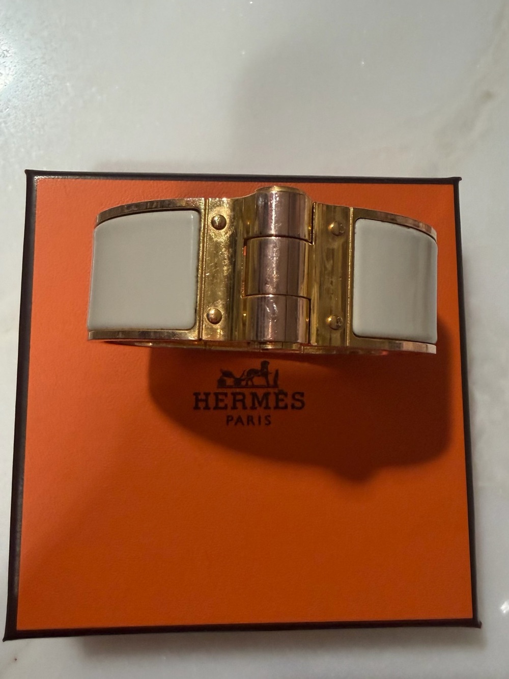 Hermès Gold-Tone Click Bracelet cream and rose gold - Picture 1 of 3